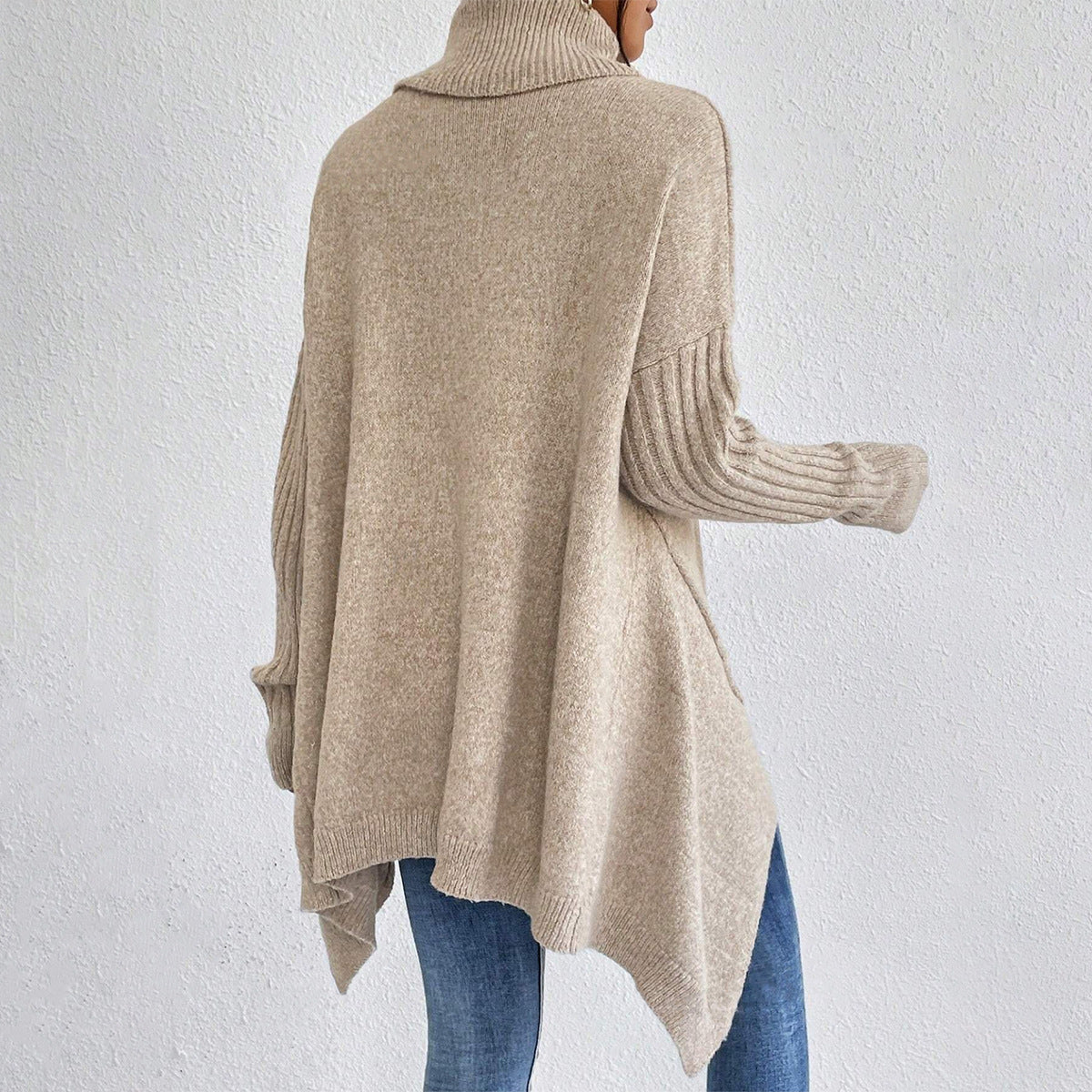 Oversized Roll Neck Jumper for Women with Asymmetric Hem